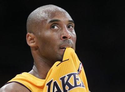Los Angeles Lakers' Bryant bites his jersey during their NBA Western Conference playoff against Oklahoma City Thunder in Los Angeles